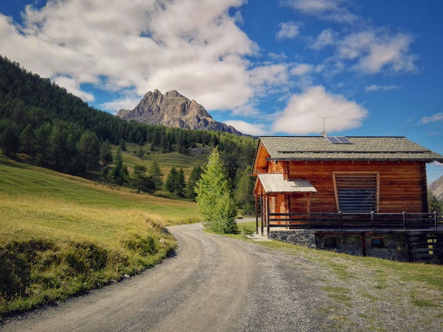 A picturesque wooden cabin in Semogo, Italy with stunning mountain views and lush greenery
